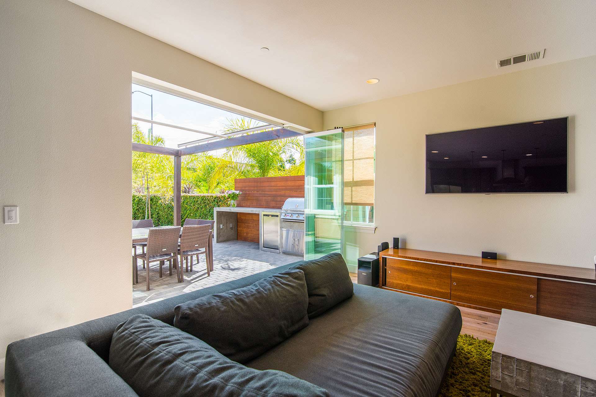 frameless sliding glass doors tv room,THE BEST PATIO DOORS TO LIGHT UP YOUR LIVING ROOM