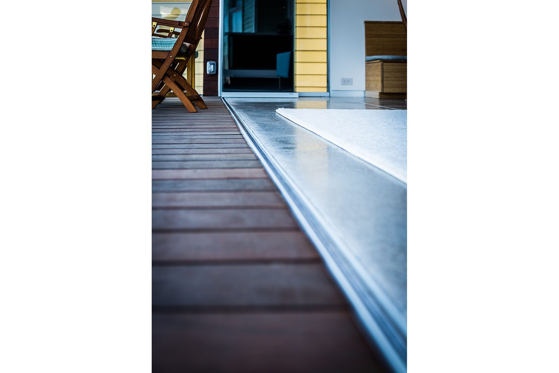 Frameless sliding glass door track.