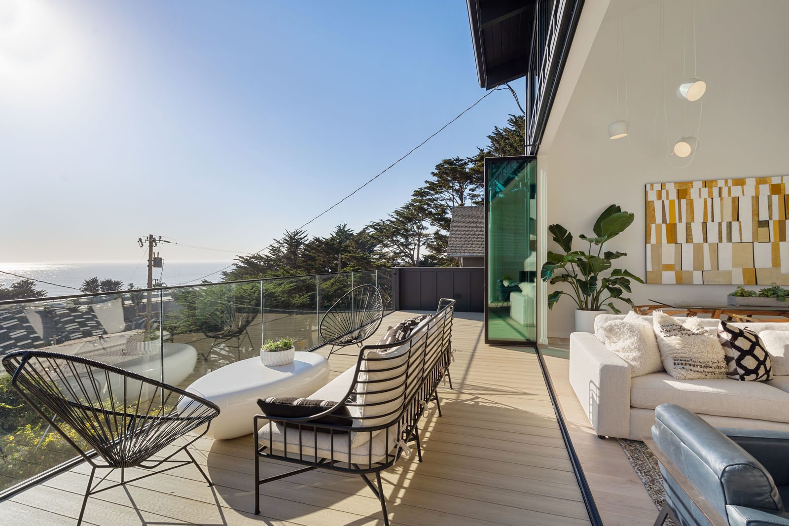 side image of stacked folding glass doors